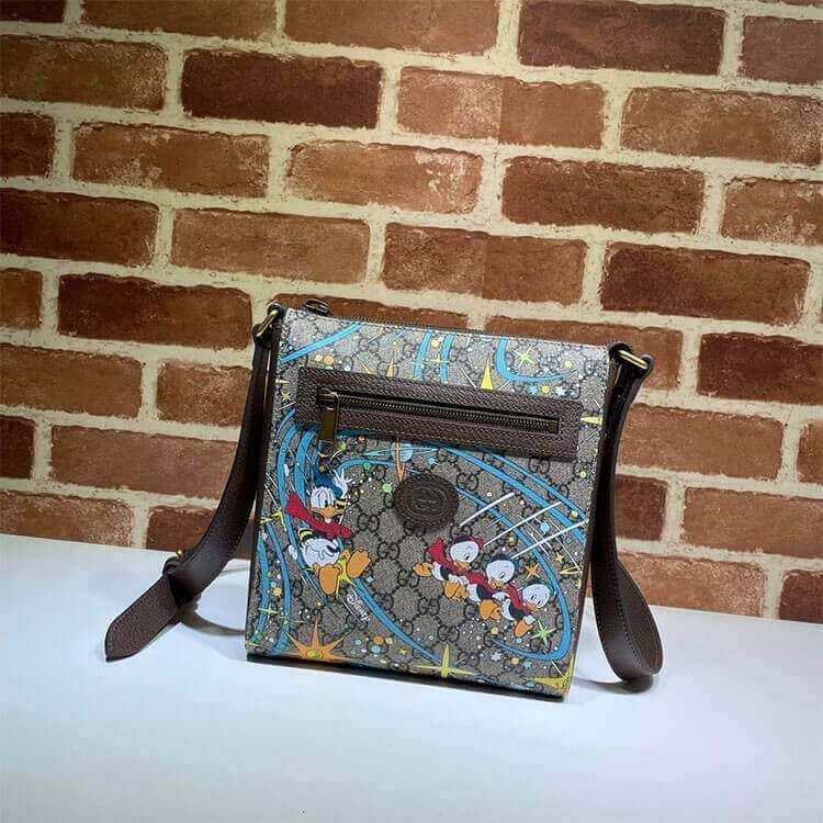 53db9821c39e2a118e9cca48996bbf2e.jpg GUCCI Disney x Gucci Donald Duck Messenger Bag - Image 1